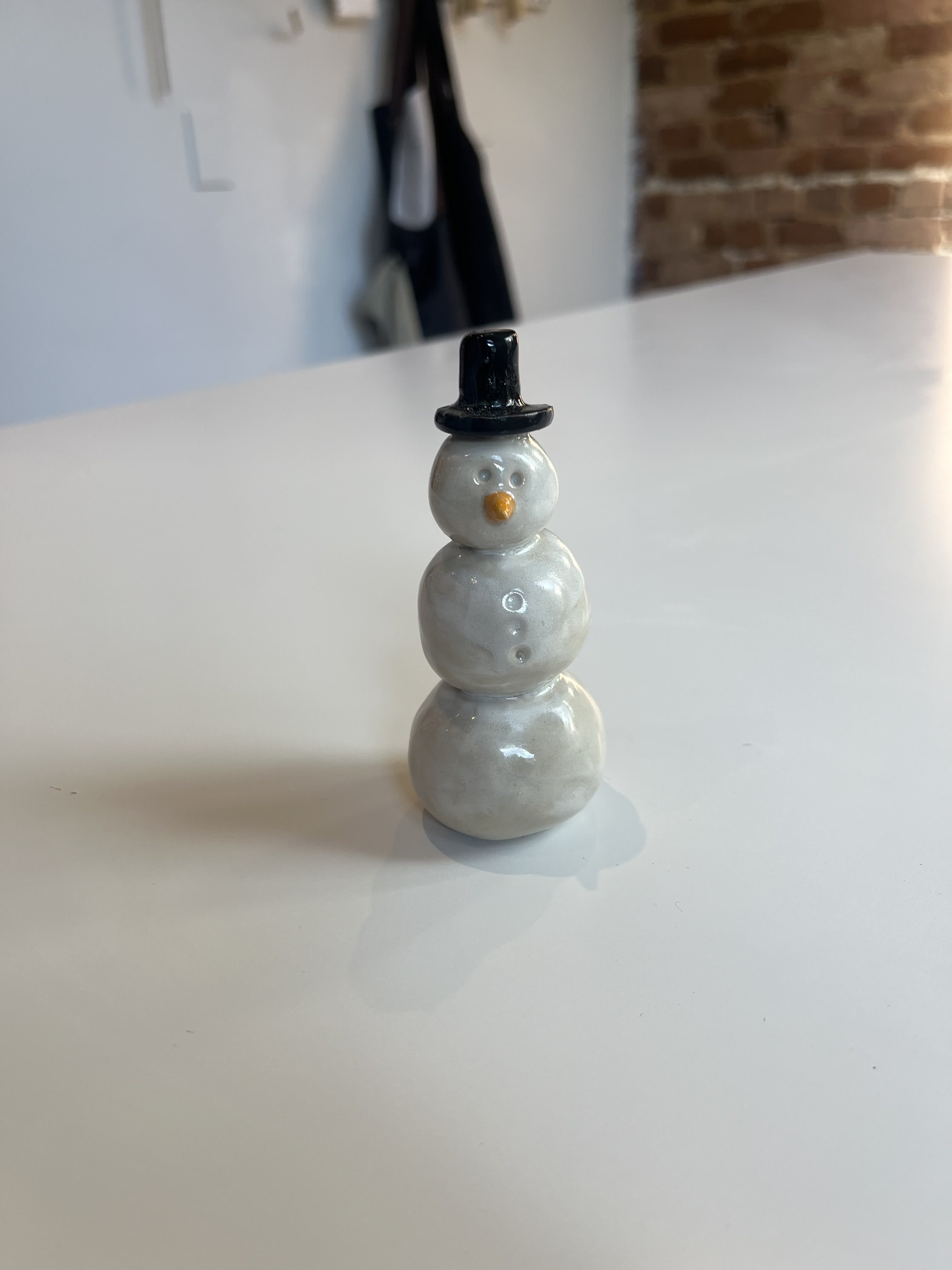 Snowman + bear figurine, made by Alexandra Di Fabrizio